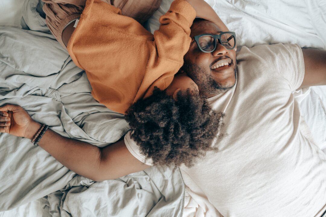 High-density Foam Mattress Enhances Comfort - Dad and child lying on their bed